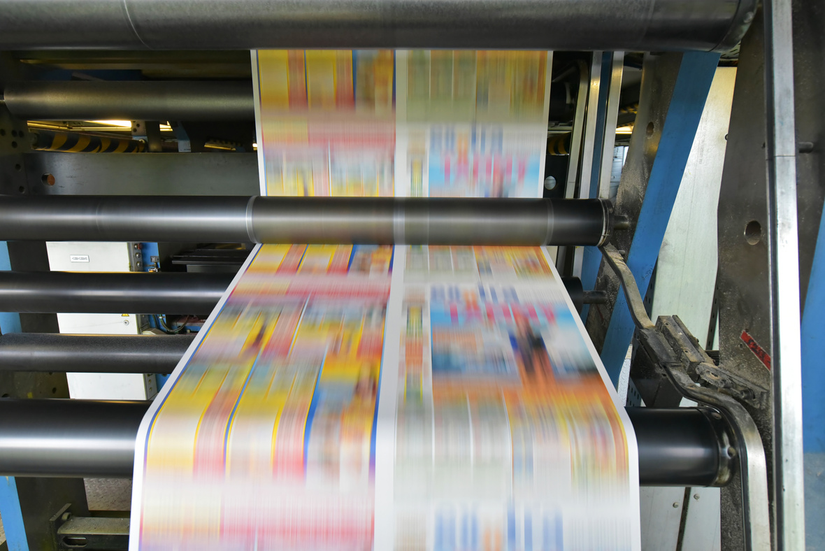 printing of coloured newspapers with an offset printing machine at a printing press company